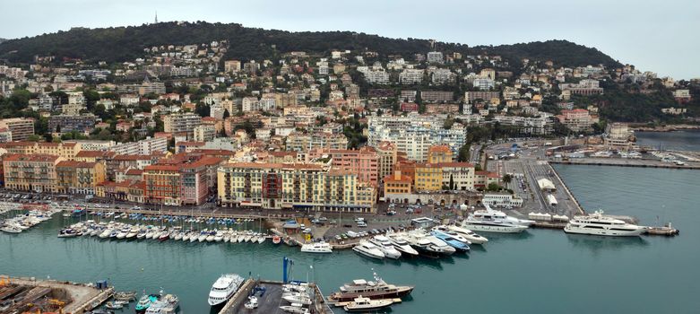 NICE, FRANCE - APRIL 29: View of Port de Nice on April 29, 2013 in Nice, France. Port de Nice was started in 1745.

Nice, France - April 29, 2013: View of Port de Nice in French Riviera. Port de Nice was started in 1745.