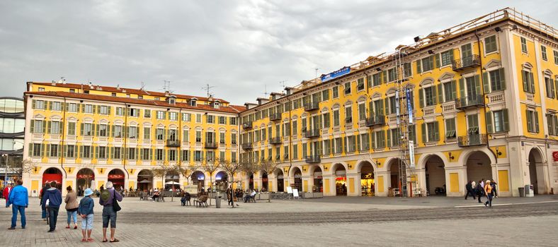 NICE, FRANCE - APRIL 29: Architecture of Place Garibaldi in Vieille Ville on April 29, 2013 in Nice, France.

Nice, France - April 29, 2013: Place Garibaldi in Vieille Ville. People are walking by square.