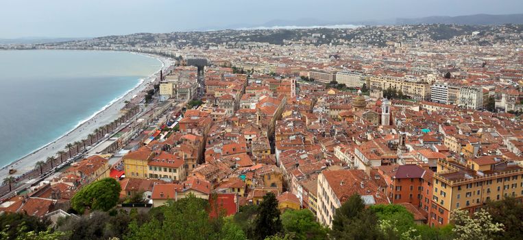 NICE, FRANCE - APRIL 29: Wonderful panoramic view with colorful historical houses of the old city on April 29, 2013 in Nice, France. 

Nice, France - April 29, 2013: Wonderful panoramic view with colorful historical houses of the old city.