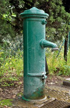 An old fashioned water pump.