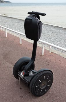 NICE, FRANCE - APRIL 29: Rental of Segway PT on April 29, 2013 in Nice, France. The Segway PT is a two-wheeled, self-balancing, battery-powered electric vehicle. 

Nice, France - April 29, 2013: Rental of Segway PT. The Segway PT is a two-wheeled, self-balancing, battery-powered electric vehicle.