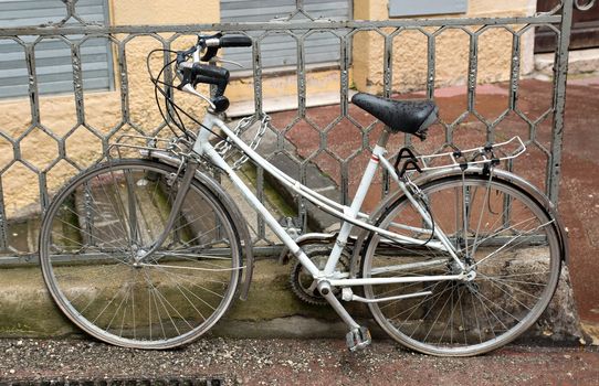 Vintage bicycle parked on the street in Nice, France

NICE - APRIL 30: Vintage bicycle parked on the street on April 30, 2013 in Nice, France.
