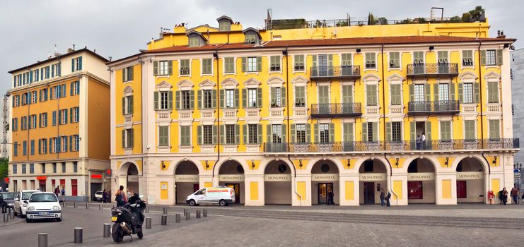 NICE, FRANCE - APRIL 29: Architecture of Place Garibaldi in Vieille Ville on April 29, 2013 in Nice, France.

Nice, France - April 29, 2013: Place Garibaldi in Vieille Ville. People are walking by square.