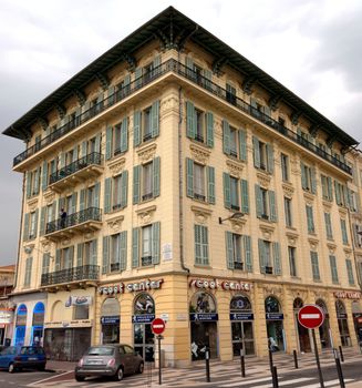NICE, FRANCE - APRIL 29: Architecture along Promenade des Anglais on April 29, 2013 in Nice, France. It is a symbol of the Cote d'Azur and was built in 1830 at the expense of the British colony.

Nice, France - April 29, 2013: Architecture along Promenade des Anglais. Promenade des Anglais is a symbol of the Cote d'Azur and was built in 1830 at the expense of the British colony.