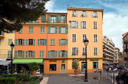 NICE, FRANCE - APRIL 30: Streets and architecture of buildings on April 30, 2013 in Nice, France. 

Nice, France - April 30, 2013: Streets and architecture of buildings.