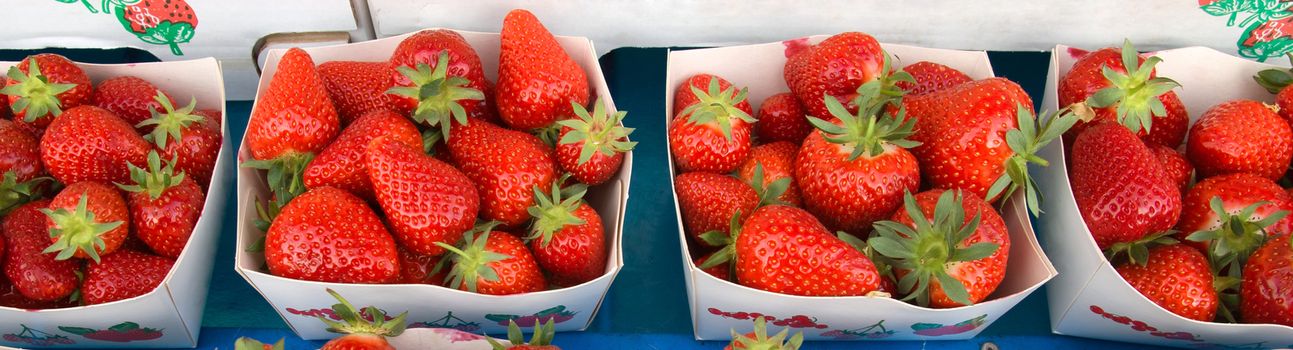 Fresh strawberries at a farmers market in France