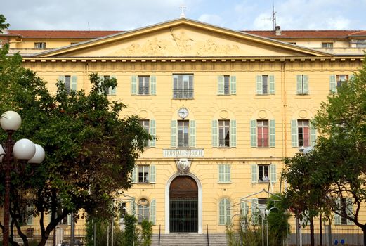 NICE, FRANCE - MAY 1: Fasade of Central Hospital on May 1, 2013 in Nice, France.

Nice, France - May 1, 2013: Fasade of Central Hospital in Nice, French Riviera. Architecture in the city is very different, here you can see both classical and modern architecture.