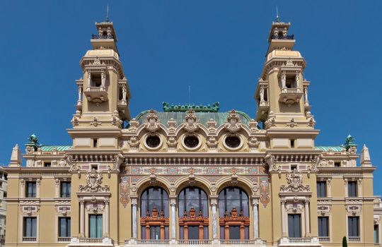 MONTE CARLO, MONACO - MAY 1: Front of the Grand Casino on May 1, 2013 in Monte Carlo, Monaco. The Casino is one of the most notable buildings in Principality. 

Monte Carlo, Monaco - May 1, 2013: Front of the Grand Casino. The Casino is one of the most notable buildings in Principality.