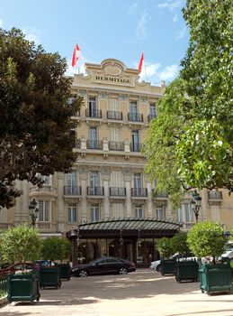 MONTE CARLO, MONACO - MAY 1: Hotel Hermitage on May 1, 2013 in Monte Carlo, Monaco. This historic luxury hotel was built in the early 1900s in the heart of Monte-Carlo.

Monte Carlo, Monaco - May 1, 2013: Hotel Hermitage. This historic luxury hotel was built in the early 1900s in the heart of Monte-Carlo.