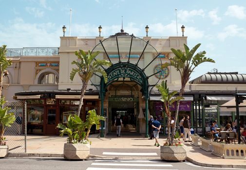 MONTE CARLO, MONACO - MAY 1: The entrance to the world famous Cafe de Paris on May 1, 2013 in Monte Carlo, Monaco. Cafe de Paris is one of the oldest and most stylish restaurants in Monte Carlo.

Monte Carlo, Monaco - May 1, 2013: The entrance to the world famous Cafe de Paris. Cafe de Paris is one of the oldest and most stylish restaurants in Monte Carlo. Tourists are entering to the cafe and casino.