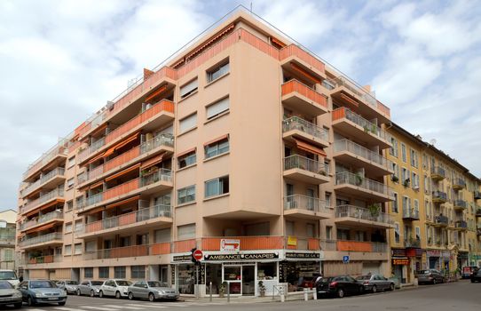 NICE, FRANCE - APRIL 30: Streets and architecture of buildings on April 30, 2013 in Nice, France. 

Nice, France - April 30, 2013: Streets and architecture of buildings.