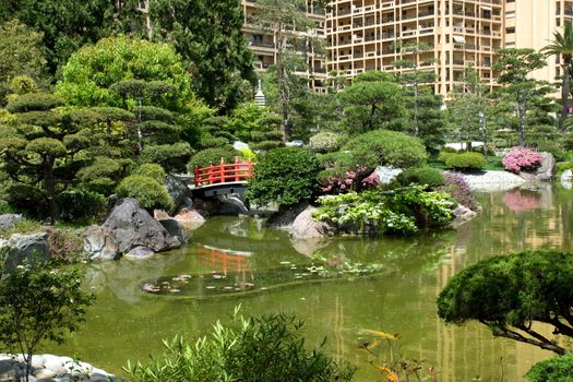 Japanese garden of Monaco with a pond.