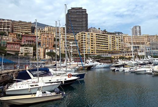 MONTE CARLO, MONACO - MAY 1: Cityscape and harbor Hercules on May 1, 2013 in Monte Carlo, Monaco. 

Monte Carlo, Monaco - May 1, 2013: Cityscape and harbor Hercules.