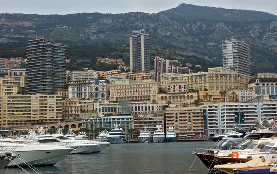 MONTE CARLO, MONACO - MAY 1: Cityscape and harbor Hercules on May 1, 2013 in Monte Carlo, Monaco. 

Monte Carlo, Monaco - May 1, 2013: Cityscape and harbor Hercules.