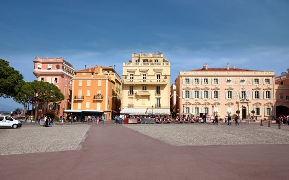 MONTE CARLO, MONACO - MAY 1: Architecture view of opposite the Palace of the Prince of Monaco on May 1, 2013 in Monte Carlo, Monaco. 

Monte Carlo, Monaco - May 1, 2013: Architecture view of opposite the Palace of the Prince of Monaco. People are walking.