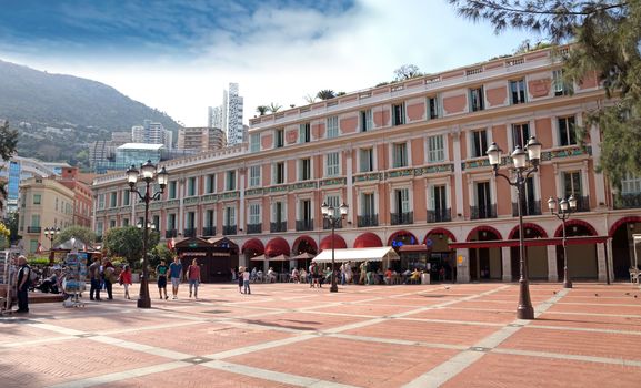 MONTE CARLO, MONACO - MAY 1: The architecture of buildings on May 1, 2013 in Monte Carlo, Monaco. 

Monte Carlo, Monaco - May 1, 2013: The architecture of buildings. People are walking.
