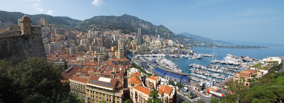 MONTE CARLO, MONACO - MAY 1: Harbour and panoramic viewed from the Palace Square on May 1, 2013 in Monte Carlo, Monaco. 

Monte Carlo, Monaco - May 1, 2013: Monaco Harbour and Monte Carlo panoramic viewed from the Palace Square