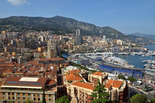 MONTE CARLO, MONACO - MAY 1: Harbour and panoramic viewed from the Palace Square on May 1, 2013 in Monte Carlo, Monaco. 

Monte Carlo, Monaco - May 1, 2013: Monaco Harbour and Monte Carlo panoramic viewed from the Palace Square.