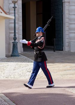 MONTE CARLO, MONACO - MAY 1: Guardsman on duty at official residence of Prince on May 1, 2013 in Monte Carlo, Monaco. 

Monte Carlo, Monaco - May 1, 2013: Guardsman on duty at official residence of Prince