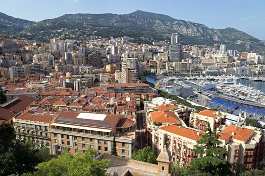 MONTE CARLO, MONACO - MAY 1: Harbour and panoramic viewed from the Palace Square on May 1, 2013 in Monte Carlo, Monaco. 

Monte Carlo, Monaco - May 1, 2013: Monaco Harbour and Monte Carlo panoramic viewed from the Palace Square.