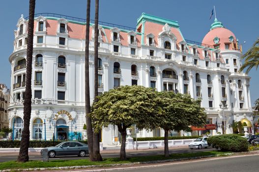 NICE, FRANCE - MAY 2: Luxury Hotel Negresco on May 2, 2013 in Nice, France. Hotel Negresco is the famous luxury hotel on the Promenade des Anglais in Nice, a symbol of the Cote d'Azur.

Nice, France - May 2, 2013: Luxury Hotel Negresco on English Promenade in Nice, French Riviera. Hotel Negresco is the famous luxury hotel on the Promenade des Anglais in Nice, a symbol of the Cote d'Azur.
