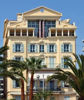 NICE, FRANCE - MAY 2: Architecture along Promenade des Anglais on May 2, 2013 in Nice, France. Promenade des Anglais is a symbol of the Cote d'Azur and was built in 1830 at the expense of the British colony.

Nice, France - May 2, 2013: Architecture along Promenade des Anglais. Promenade des Anglais is a symbol of the Cote d'Azur and was built in 1830 at the expense of the British colony.