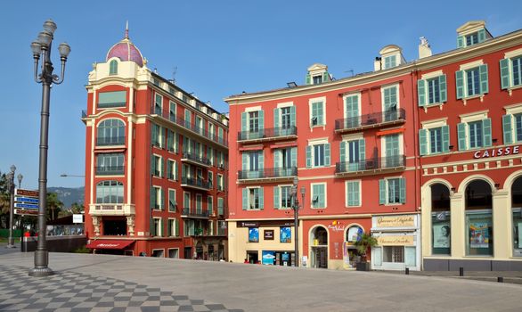 NICE, FRANCE - MAY 2:  Architecture of Place Massena on May 2, 2013 in Nice, France. The square was reconstructed in 1979. Square is located in the city center and is the most popular destination among tourists. 

Nice, France - May 2, 2013: Architecture of Place Massena. Square is located in the city center and is the most popular destination among tourists. The square was reconstructed in 1979.