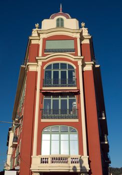 NICE, FRANCE - MAY 2:  Architecture of Place Massena on May 2, 2013 in Nice, France. The square was reconstructed in 1979. Square is located in the city center and is the most popular destination among tourists. 

Nice, France - May 2, 2013: Architecture of Place Massena. Square is located in the city center and is the most popular destination among tourists. The square was reconstructed in 1979. There are many boutiques, cafes and restaurants.