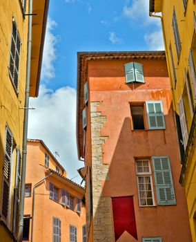 Architecture of Grasse Town in the southern France. It is a city in the French department of Alpes-Maritimes. Grasse is famous for its perfume industry. The city was founded in the XI century.