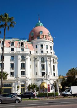 NICE, FRANCE - MAY 4: Luxury Hotel Negresco on May 4, 2013 in Nice, France. Hotel Negresco is the famous luxury hotel on the Promenade des Anglais in Nice, a symbol of the Cote d'Azur.

Nice, France - May 4, 2013: Luxury Hotel Negresco on English Promenade in Nice, French Riviera. Hotel Negresco is the famous luxury hotel on the Promenade des Anglais in Nice, a symbol of the Cote d'Azur