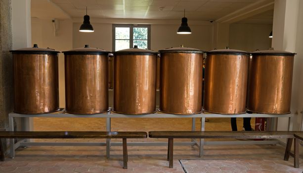 Ancient distiller for the production of perfume in Fragonard factory in Grasse, France