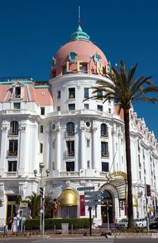 NICE, FRANCE - MAY 4: Luxury Hotel Negresco on May 4, 2013 in Nice, France. Hotel Negresco is the famous luxury hotel on the Promenade des Anglais in Nice, a symbol of the Cote d'Azur.

Nice, France - May 4, 2013: Luxury Hotel Negresco on English Promenade in Nice, French Riviera. Hotel Negresco is the famous luxury hotel on the Promenade des Anglais in Nice, a symbol of the Cote d'Azur