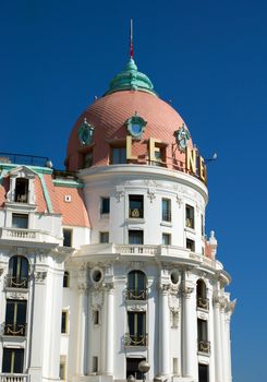NICE, FRANCE - MAY 4: Luxury Hotel Negresco on May 4, 2013 in Nice, France. Hotel Negresco is the famous luxury hotel on the Promenade des Anglais in Nice, a symbol of the Cote d'Azur.

Nice, France - May 4, 2013: Luxury Hotel Negresco on English Promenade in Nice, French Riviera. Hotel Negresco is the famous luxury hotel on the Promenade des Anglais in Nice, a symbol of the Cote d'Azur