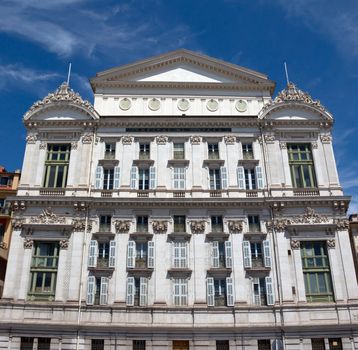 NICE, FRANCE - MAY 4: Opera de Nice located at the Promenade des Anglais on May 4, 2013 in Nice, France. It was built in 1776 by Marquess Alli-Maccarani.

Nice, France - May 4, 2013: Front facade of the Opera house. Opera de Nice located at the Promenade des Anglais. It was built in 1776 by Marquess Alli-Maccarani. Sold in 1787, it reopened in 1790 under the name “Theatre Royal”. Now Opera de Nice offers three types of performances: operas, ballets and classical concerts ; and houses the Ballet Nice Méditerrannée and the Nice Philharmonic Orchestra.