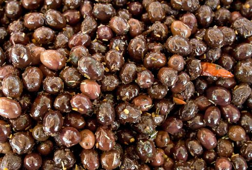 Brown olives backgrounds at the street market