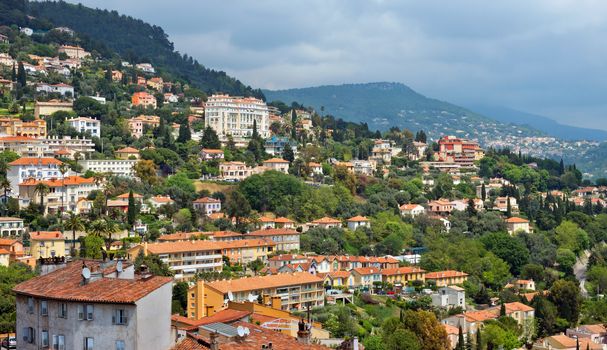 GRASSE, FRANCE - MAY 3: Panoramic view of Grasse Town on May 3, 2013 in Grasse, France. Grasse is famous for its perfume industry. The city was founded in the XI century.

Grasse, France - May 3, 2013: Panoramic view of Grasse Town in the southern France. It is a city in the French department of Alpes-Maritimes. Grasse is famous for its perfume industry. The city was founded in the XI century.