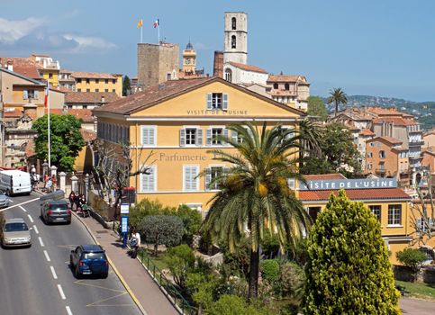 GRASSE, FRANCE - MAY 3: Perfume Fragonard Factory on May 3, 2013 in Grasse, France. Fragonard perfumery is one of the older factory in the world capital of perfumes.

Grasse, France - May 3, 2013: Perfume Fragonard Factory. Fragonard perfumery is one of the older factory in the world capital of perfumes. People go along street.