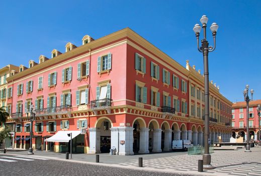 NICE, FRANCE - MAY 4: Central square - Place Massena on May 4, 2013 in Nice, France. Square is located in the city center and is the most popular destination. It was reconstructed in 1979.

Nice, France - May 4, 2013: Central square - Place Massena. Square is located in the city center and is the most popular destination among tourists. There are many boutiques, cafes and restaurants. Square was reconstructed in 1979.