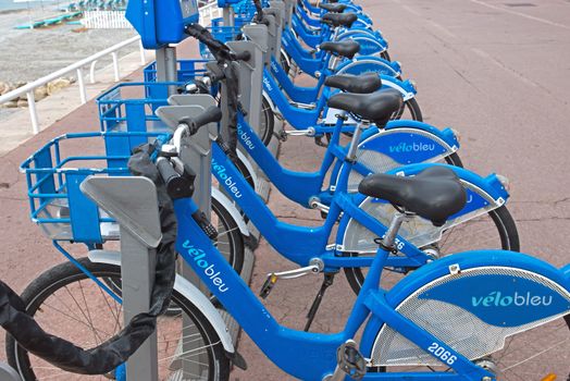 NICE, FRANCE - MAY 5: Public Bicycles Sharing Station on Promenade Des Anglais on May 5, 2013 in Nice, France. One of 120 stations in Nice. This service offers over 1200 self-service bicycles.

Nice, France - May 5, 2013: Public Bicycles Sharing Station on Promenade Des Anglais. One of 120 stations in Nice. This service offers over 1200 self-service bicycles.