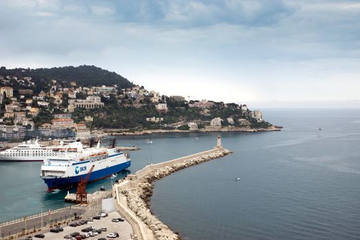 NICE, FRANCE - MAY 5: Aerial view of the Port de Nice on May 5, 2013 in Nice, France. Port de Nice was started in 1745.

Nice, France - May 5, 2013: Aerial view of the Port de Nice in French Riviera. Port de Nice was started in 1745.