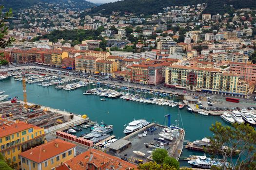 NICE, FRANCE - MAY 5: Aerial view of the Port de Nice on May 5, 2013 in Nice, France. Port de Nice was started in 1745 and now it is one of more popular ports in south France.

Nice, France - May 5, 2013: Aerial view of the Port de Nice in French Riviera. Port de Nice was started in 1745 and now it is one of more popular ports in south France.