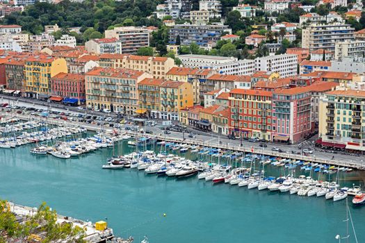 NICE, FRANCE - MAY 5: Aerial view of the Port de Nice on May 5, 2013 in Nice, France. Port de Nice was started in 1745.

Nice, France - May 5, 2013: Aerial view of the Port de Nice in French Riviera. Port de Nice was started in 1745.