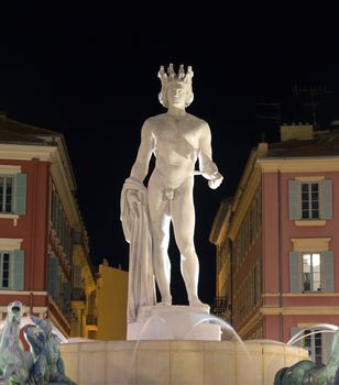 NICE, FRANCE - MAY 6:  Fountain Soleil on Place Massena at night on May 6, 2013 in Nice, France. The square was reconstructed in 1979.

Nice, France - May 6, 2013: Fountain Soleil on Place Massena at night. Square is located in the city center and is the most popular destination among tourists. The square was reconstructed in 1979.
