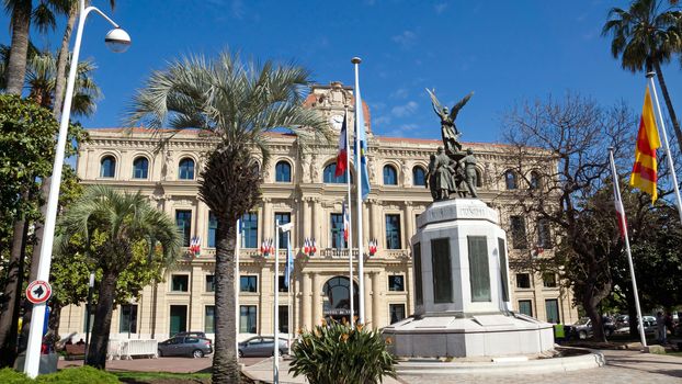 CANNES, FRANCE - MAY 6: Hotel de Ville on May 6, 2013 in Cannes, France. It is located along the Croisette, and was built in 1884.

Cannes, France - May 6, 2013: Hotel de Ville.  It is located along the Croisette, and was built in 1884.
