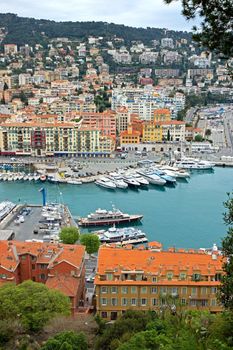 NICE, FRANCE - MAY 5: Aerial view of the Port de Nice on May 5, 2013 in Nice, France. Port de Nice was started in 1745.

Nice, France - May 5, 2013: Aerial view of the Port de Nice in French Riviera. Port de Nice was started in 1745.