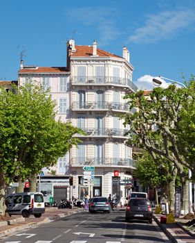 CANNES, FRANCE - MAY 6: Architecture of Cannes along the Croisette on May 6, 2013 in Cannes, France. City founded by the Romans in 42 BC.

Cannes, France - May 6, 2013: Architecture of Cannes along the Croisette. Cannes is a city located in the French Riviera. The city is also famous for its luxury shops, restaurants, and hotels. City founded by the Romans in 42 BC.