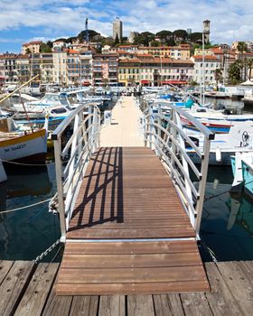 CANNES, FRANCE - MAY 6: View of Le Suquet- the old town and Port Le Vieux on May 6, 2013 in Cannes, France. City founded by the Romans in 42 BC.

Cannes, France - May 6, 2013: View of Le Suquet- the old town and Port Le Vieux of Cannes, France. Cannes is a city located in the French Riviera. The city is also famous for its luxury shops, restaurants, and hotels. City founded by the Romans in 42 BC.