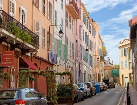 CANNES, FRANCE - MAY 6: Old district in historical centre on May 6, 2013 in Cannes, France. City founded by the Romans in 42 BC.

Cannes, France - May 6, 2013: Old district in historical centre of Cannes, France. Cannes is a city located in the French Riviera. The city is also famous for its luxury shops, restaurants, and hotels. City founded by the Romans in 42 BC.