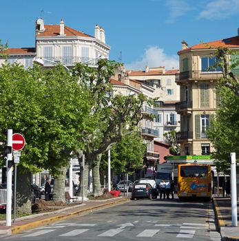 CANNES, FRANCE - MAY 6: Architecture of Cannes along the Croisette on May 6, 2013 in Cannes, France. City founded by the Romans in 42 BC.

Cannes, France - May 6, 2013: Architecture of Cannes along the Croisette. Cannes is a city located in the French Riviera. The city is also famous for its luxury shops, restaurants, and hotels. City founded by the Romans in 42 BC.