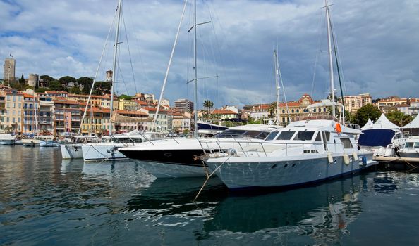 CANNES, FRANCE - MAY 6: View of Le Suquet- the old town and Port Le Vieux on May 6, 2013 in Cannes, France. City founded by the Romans in 42 BC.

Cannes, France - May 6, 2013: View of Le Suquet- the old town and Port Le Vieux of Cannes, France. Cannes is a city located in the French Riviera. The city is also famous for its luxury shops, restaurants, and hotels. City founded by the Romans in 42 BC.